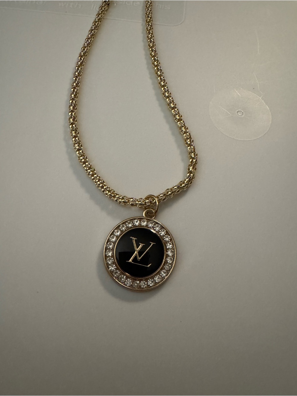 Gold and Black Crystal-Accent Logo Pendant Necklace